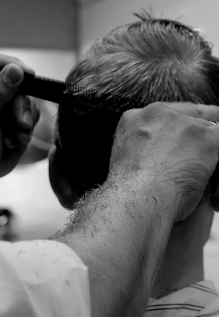 Barber checking the finish
