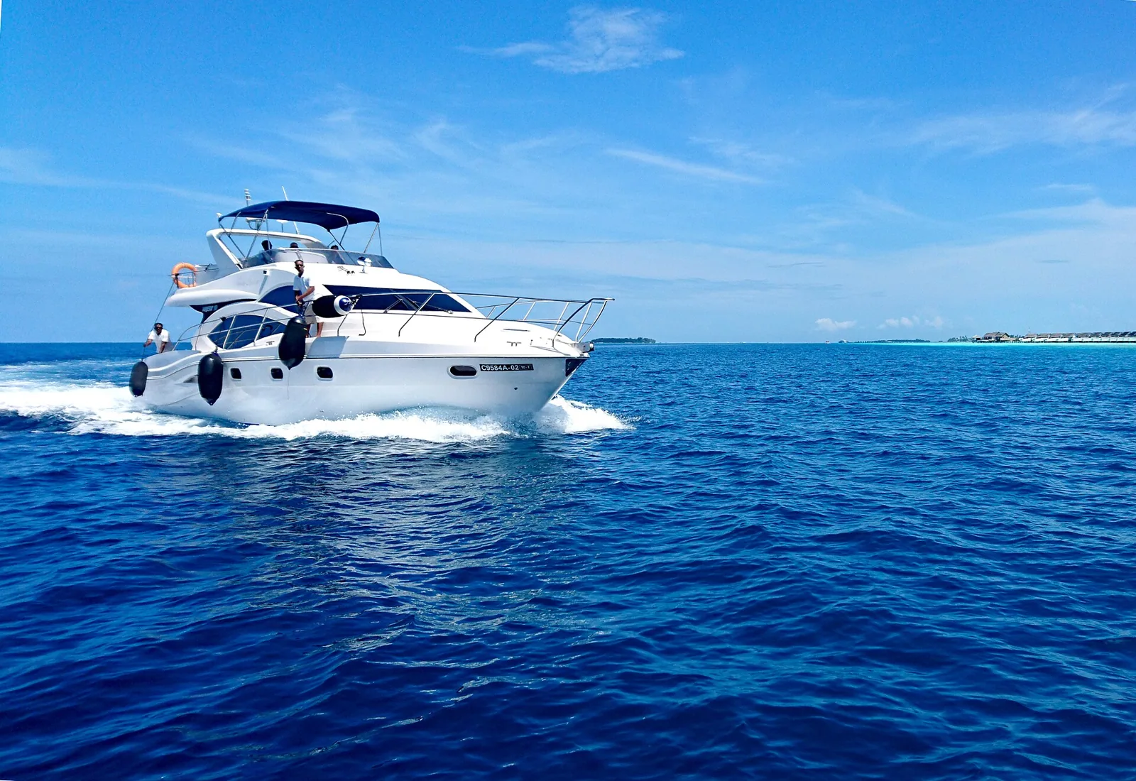 White superyacht on turquoise water
